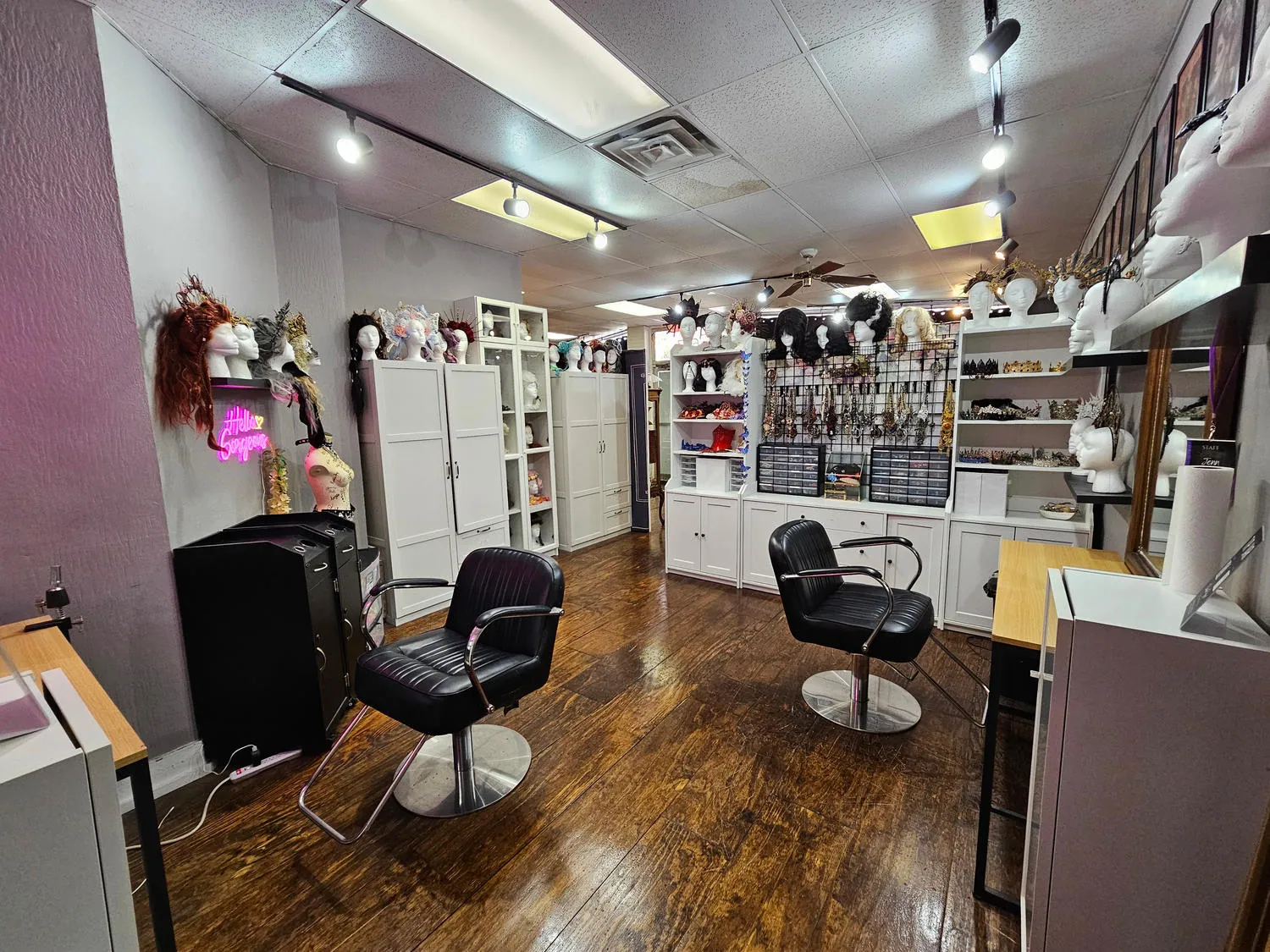 The dedicated hair and makeup salon with styling chairs, mirrors and accessory displays