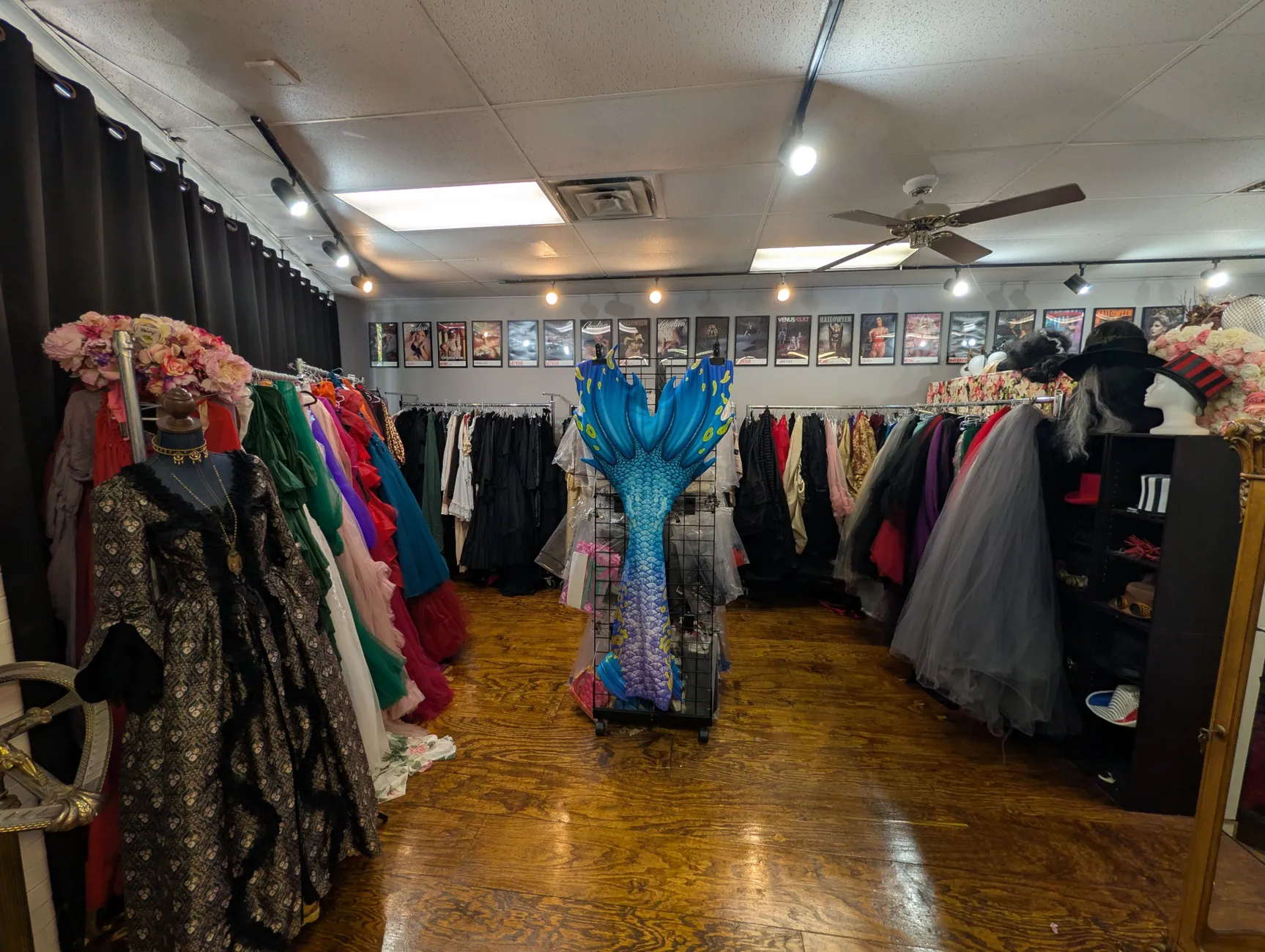 Gowns, costumes and a blue mermaid tail in the inclusive studio wardrobe