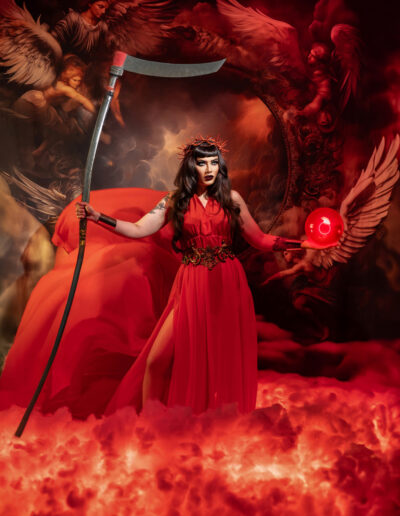 Fiery fantasy portrait of a red-clad woman holding a staff