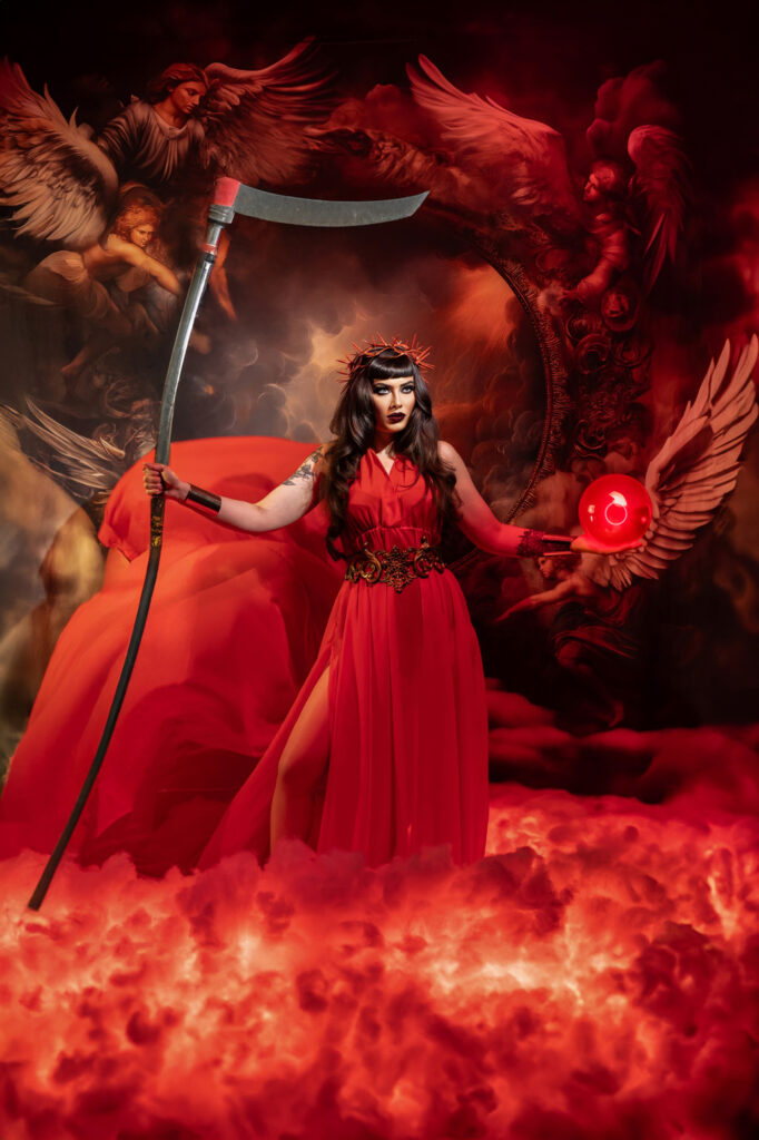 Fiery fantasy portrait of a red-clad woman holding a staff