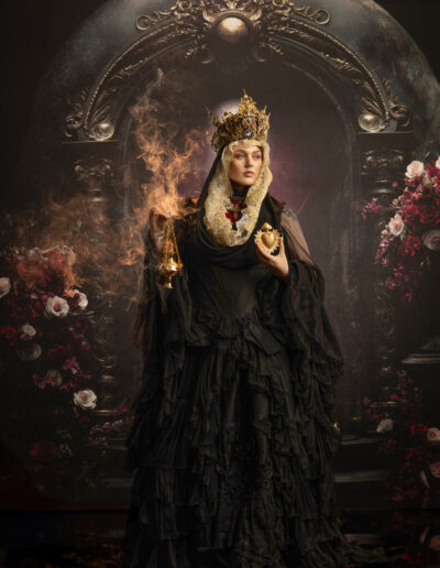 Dark mystical portrait of a witch surrounded by an enchanted forest
