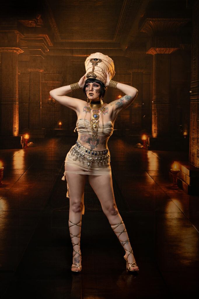 Ancient-inspired conceptual portrait in a candlelit temple setting