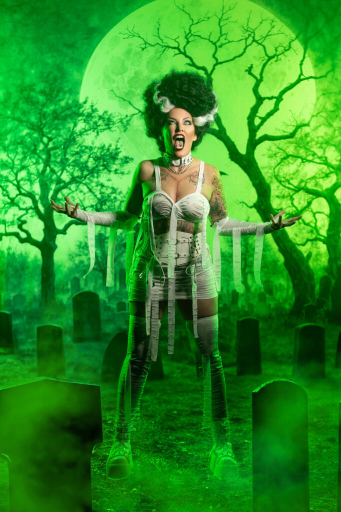 Eerie green-lit spirit in a white dress standing in a cemetery