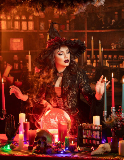 Red-haired witch performing a candlelit ritual in a dark apothecary