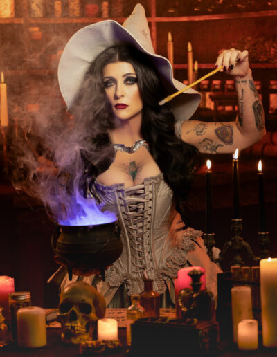 Sultry witch in a corset and pointed hat surrounded by warm candlelight