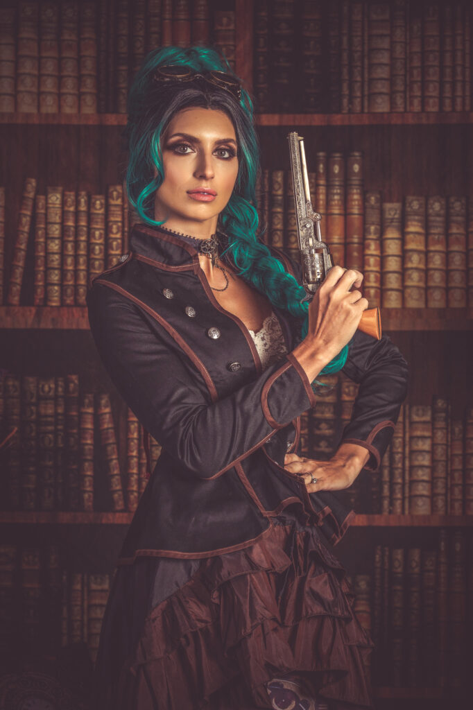 Teal-haired woman in a tailored steampunk jacket holding an antique pistol in a library.